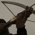 Why did the crossbow become extinct on the battlefield?