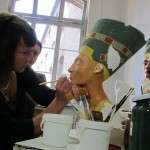 How are Nefertiti replicas created?
